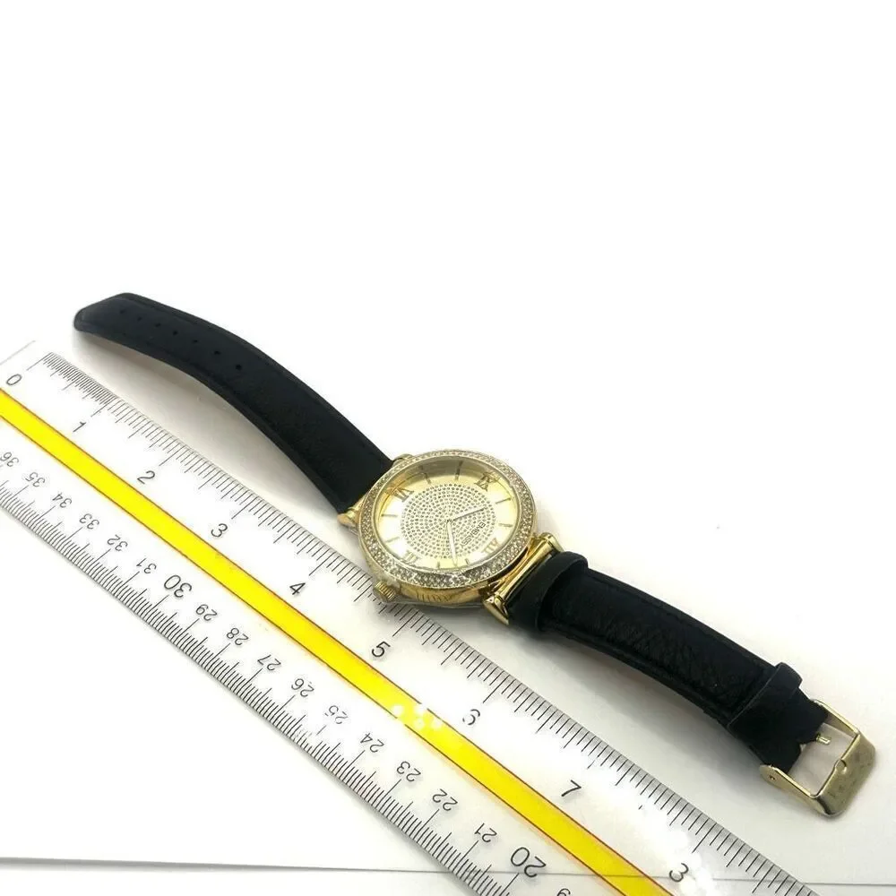 Embassy gold tone rhinestone watch